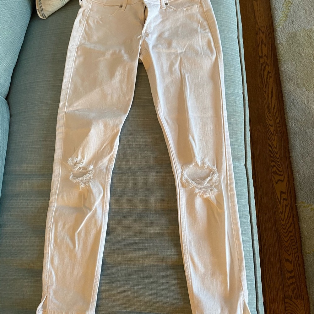A&F white jeans.Ripped at knees. Small  slits.